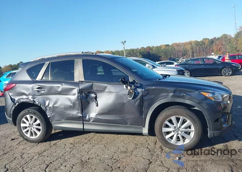 2016 Mazda Cx-5 Touring z USA, uszkodzony, nr VIN JM3KE2CYXG0745492